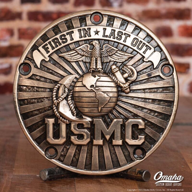Custom derby cover for Harley Davidson with Marine Corps insignia, USMC lettering and "First In - Last Out" banner