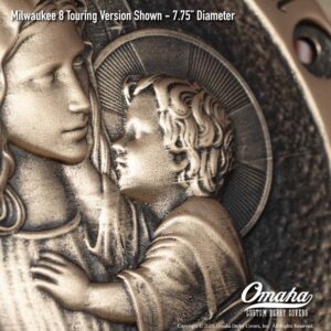 Custom bronze derby cover for Harley-Davidson motorcycle with custom sculpted Virgin Mary and Baby Jesus design