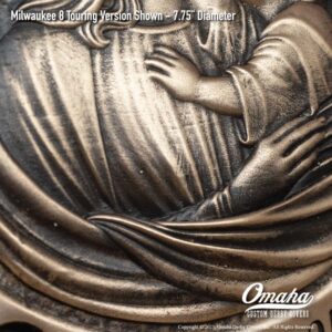 Custom bronze derby cover for Harley-Davidson motorcycle with custom sculpted Virgin Mary and Baby Jesus design