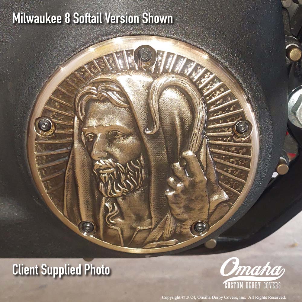 Custom derby cover on Harley-Davidson Softail motorcycle with Jesus The Good Shepherd design