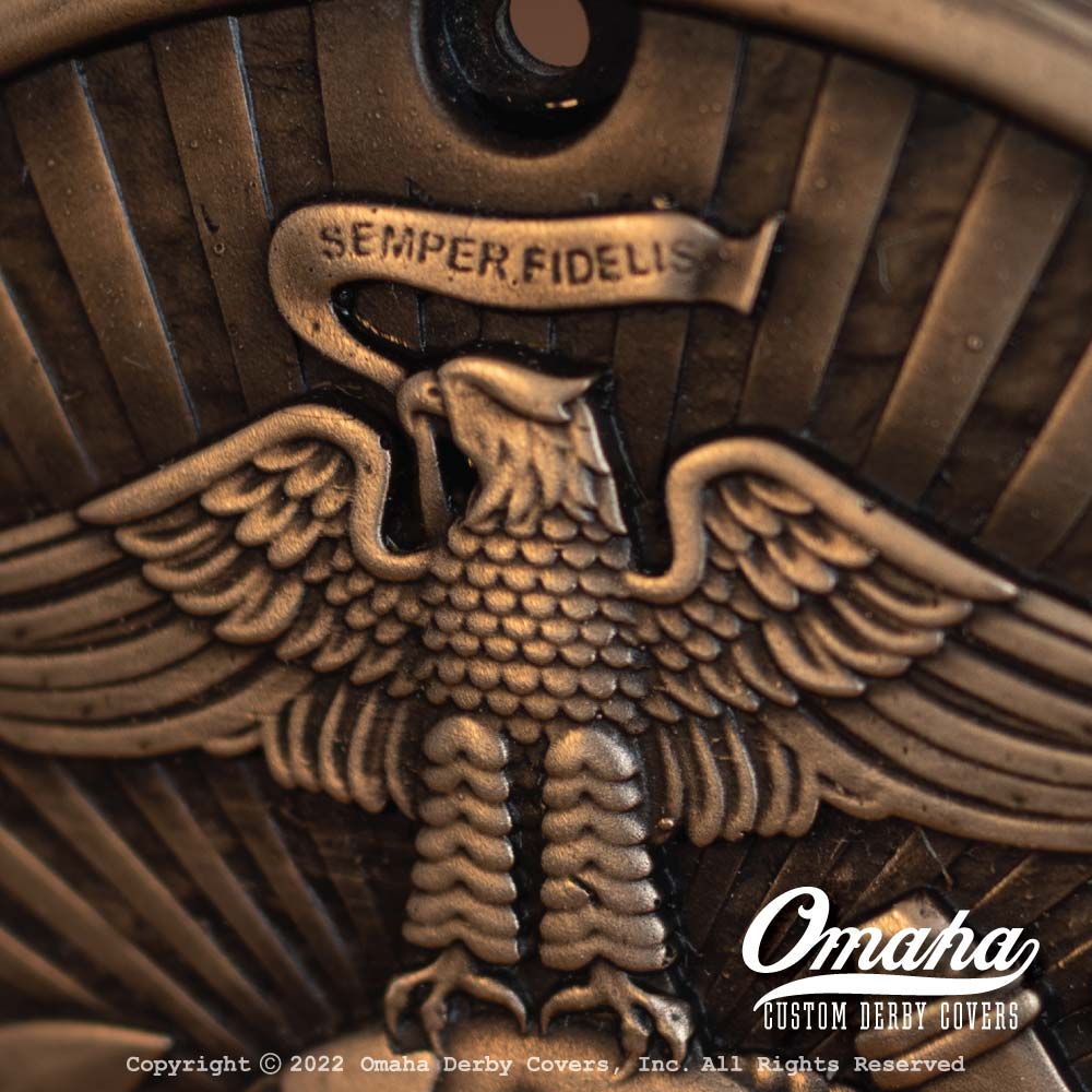 Custom derby cover with United States Marine Corps logo detail view