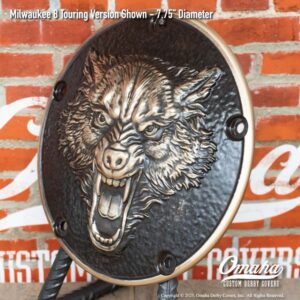 Custom derby cover for Harley-Davidson motorcycles with lone wolf design