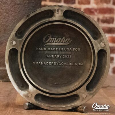 Custom derby cover for harley davidson as seen from the back side