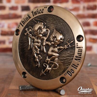 hand cast bronze custom derby cover with angel-demon motif