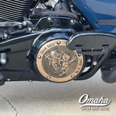 Custom derby cover for Harley Davidson motorcycle shown installed on bike.