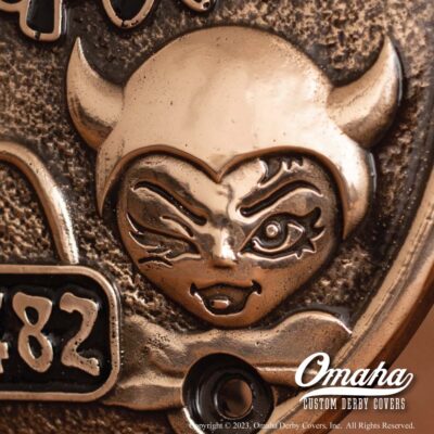 Detail view of a custom derby cover for harley davidson el diablo motorcycle sculpted in bronze