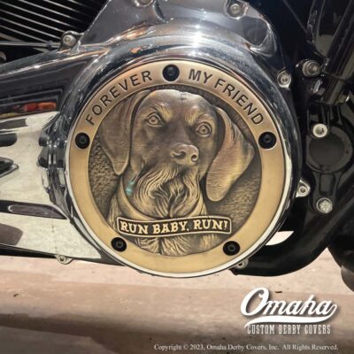 Custom derby cover for Harley Davidson motorcycle with a portrait of a dog sculpted in bronze