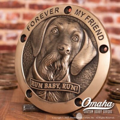 Custom derby cover for Harley Davidson motorcycle with a portrait of a dog sculpted in bronze