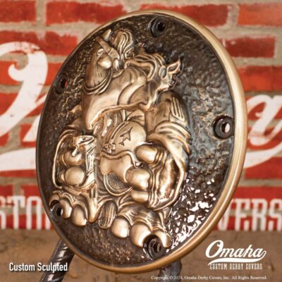 Custom sculpted derby cover for Harley-Davidson motorcycle with rhino fighter pilot and pinup girl design