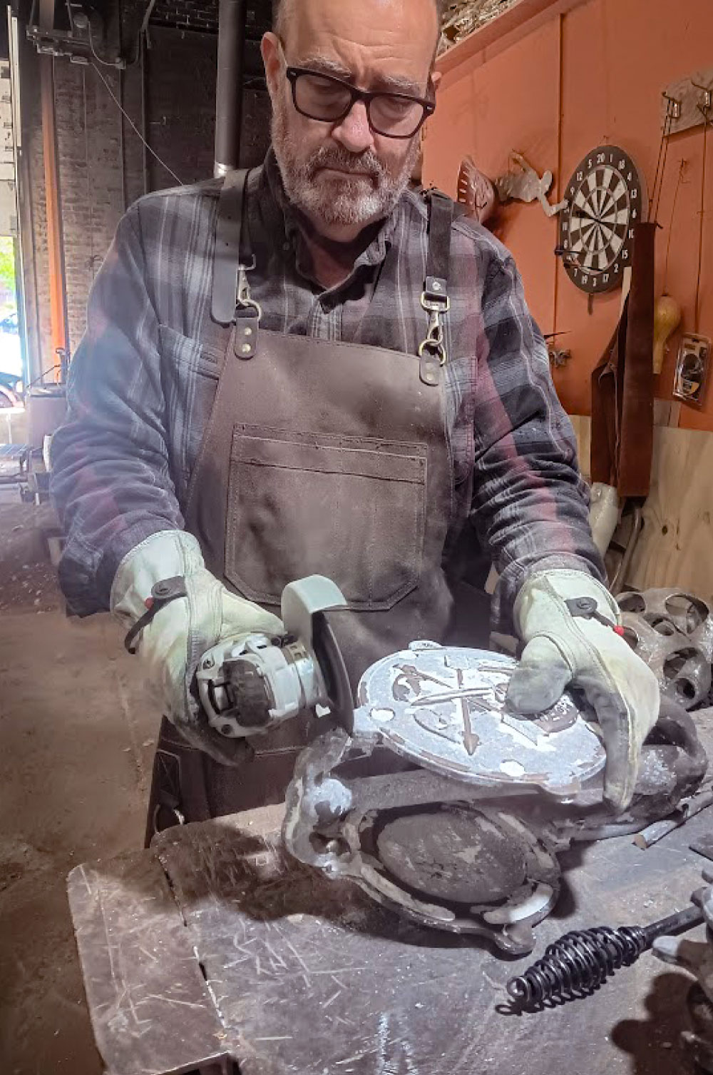 Jeff Miller working in the Omaha Derby Covers shop