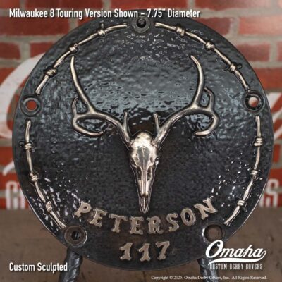 Custom derby cover for Harley-Davidson motorcycle with deer skull and antlers sculpted design