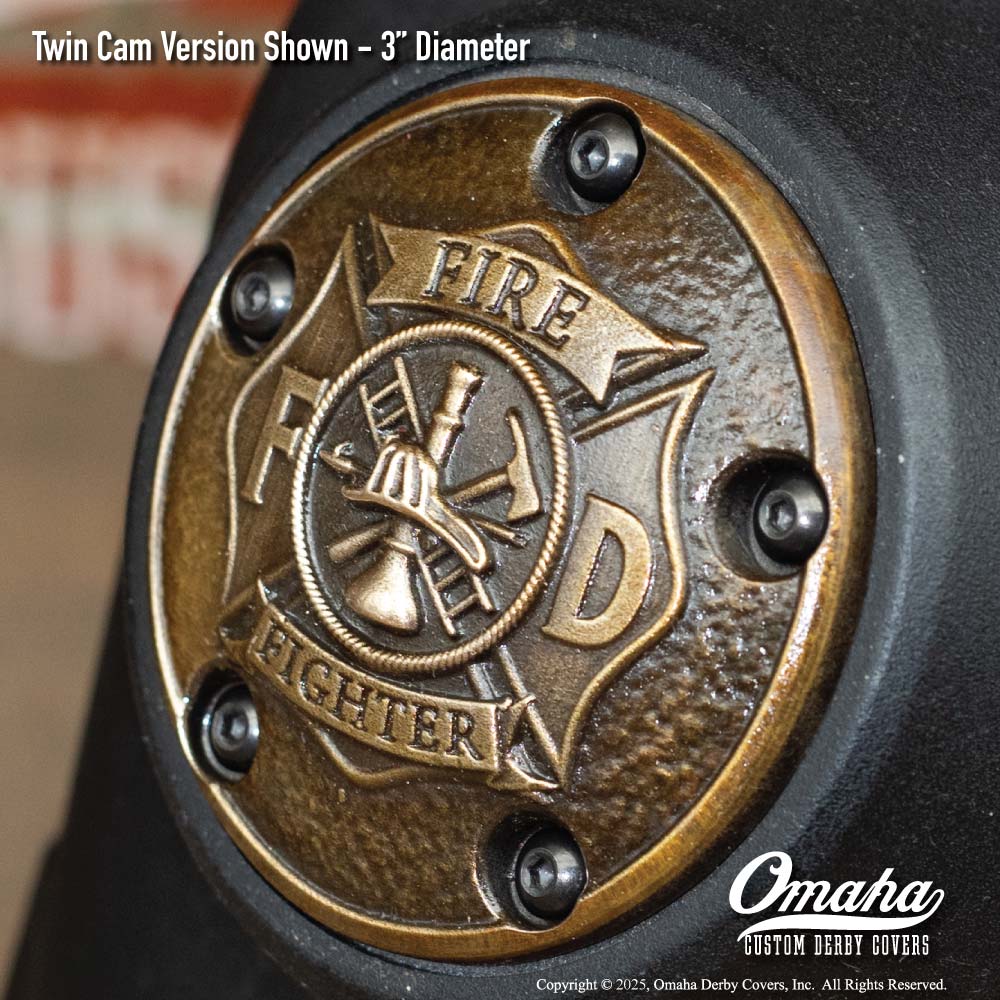 Custom bronze fire fighter / St Florian Cross timing cover for Harley-Davidson motorcycle with Twin Cam motor