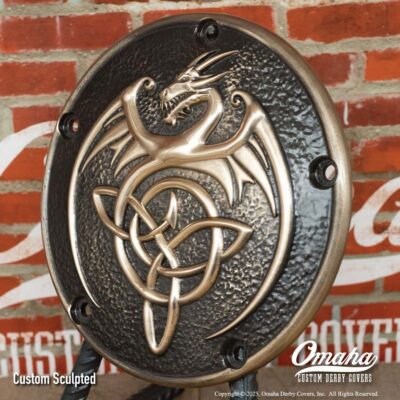 Custom bronze derby cover for Harley-Davidson motorcycle with custom sculpted dragon design