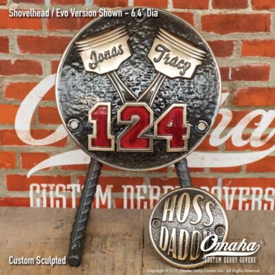 Custom derby cover for Harley-Davidson with crossed pistons design