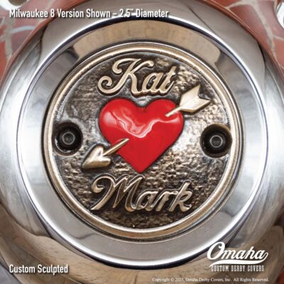 Custom timing cover for Harley-Davidson with arrow through heart design