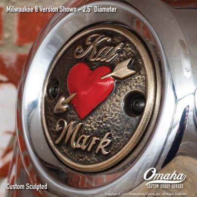 Custom timing cover for Harley-Davidson with arrow through heart design